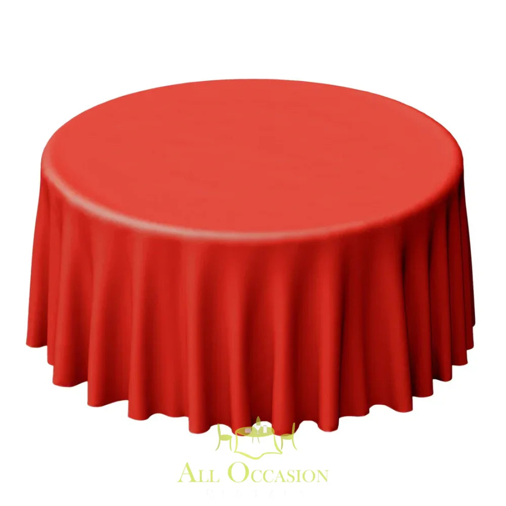 120 Inch Round Polyester Tablecloth Red draping elegantly over a round table for events and celebrations.