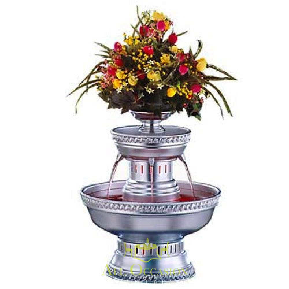 Beverage fountain with flowers, ideal for receptions and events, available for rental in Corona, CA.