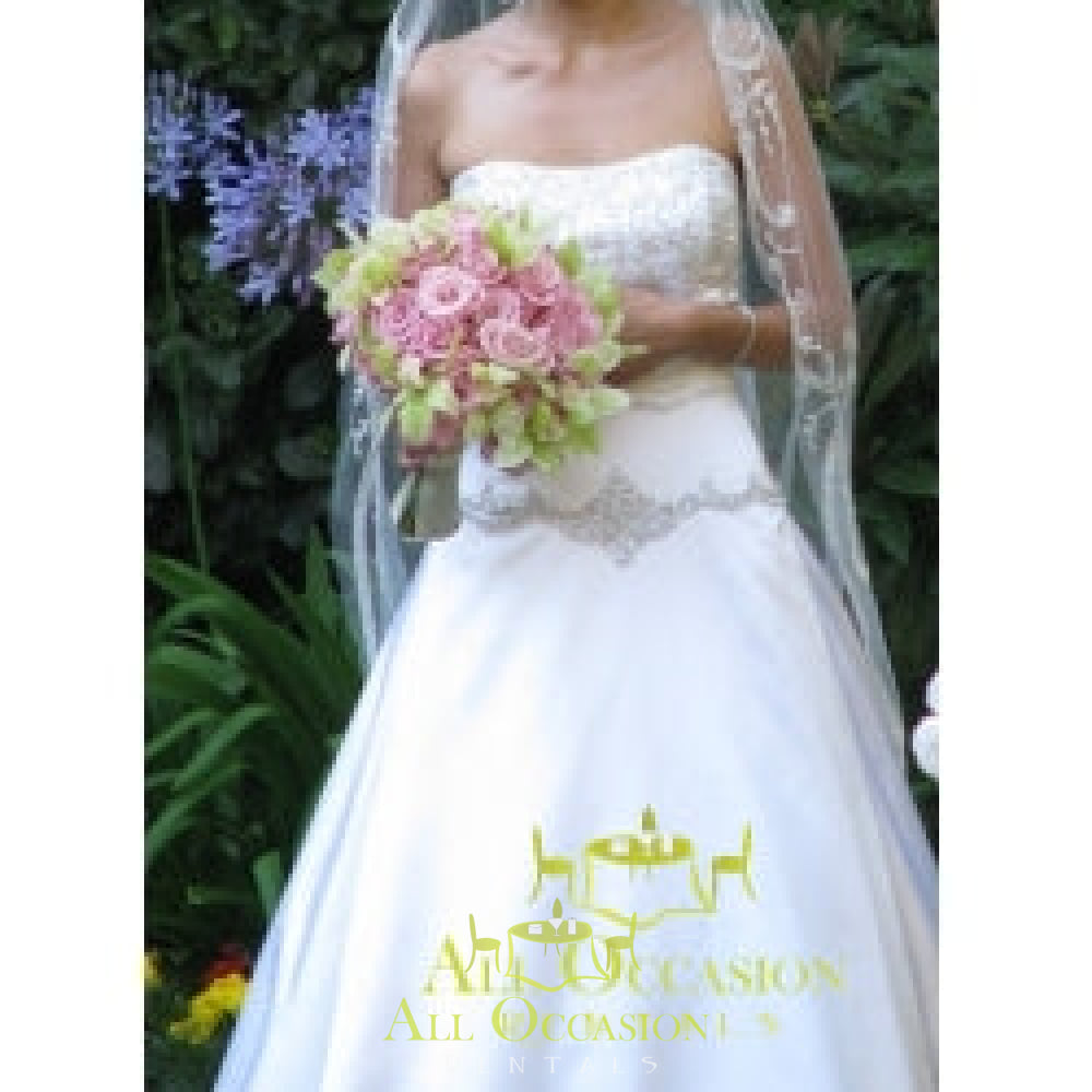 Bride holding a beautiful bouquet of flowers at a wedding, showcasing elegant Bouquets Flowers arrangement.