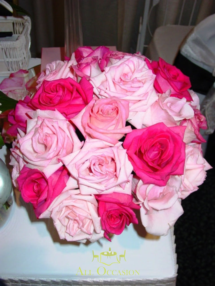Bouquets Flowers - a stunning arrangement of pink and white roses ideal for weddings.