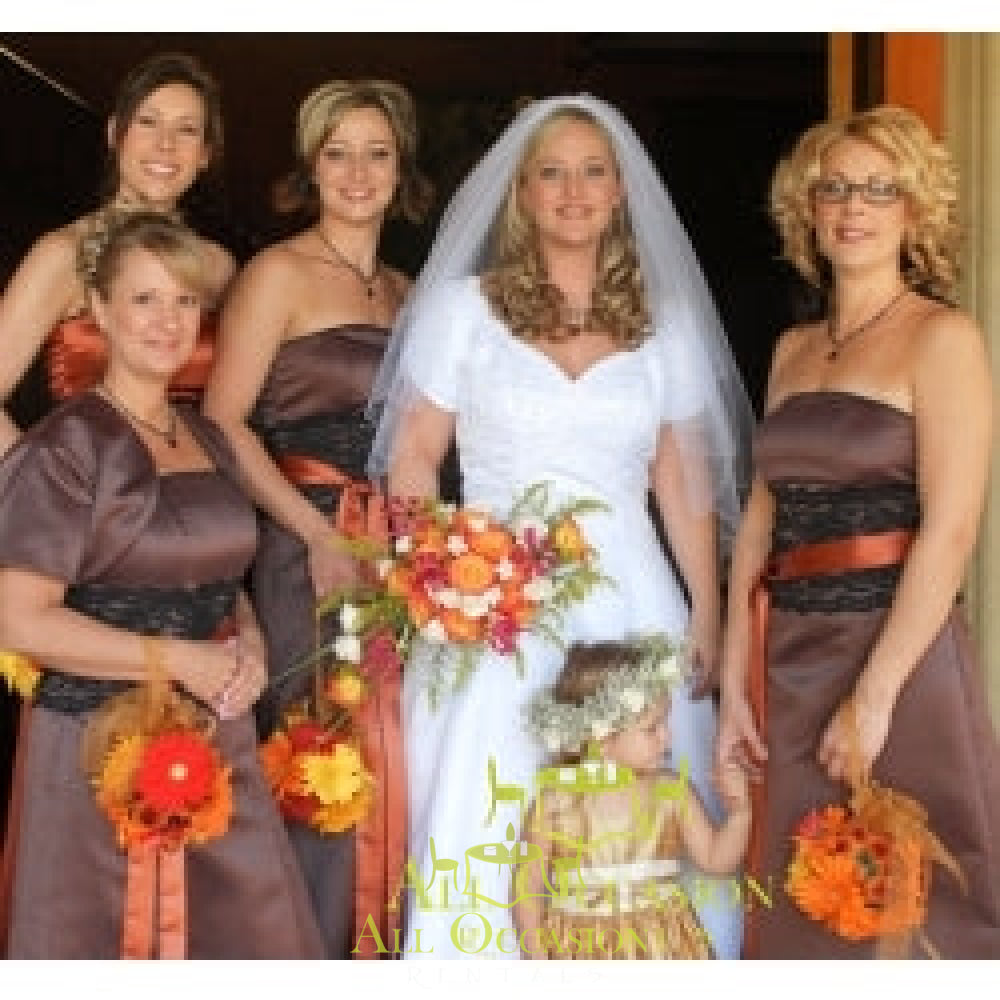 Bouquets Flowers featuring a bride and bridesmaids holding colorful floral arrangements in elegant dresses.