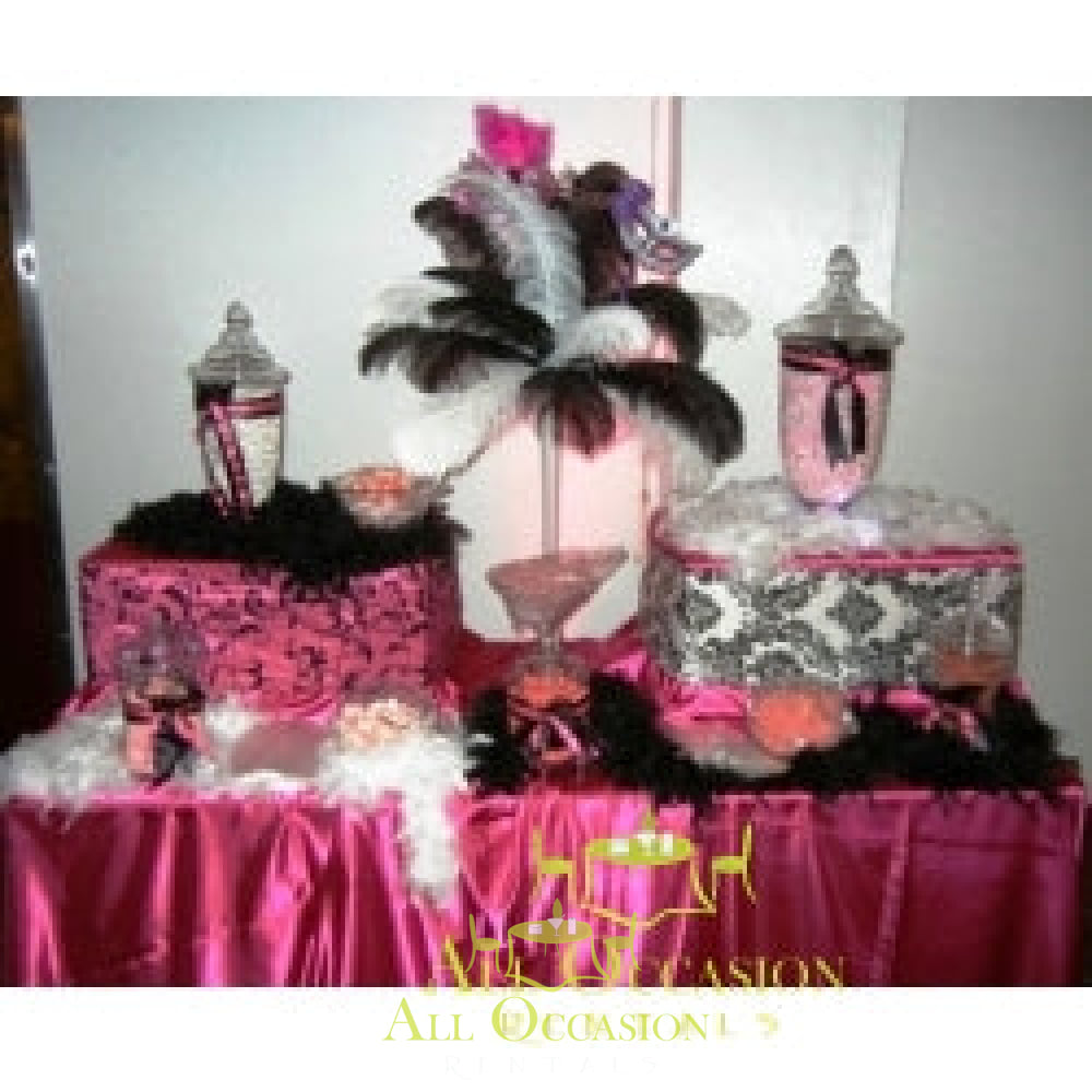 Candy Buffet CB-05 featuring colorful decorations and elegant jars on a pink table.