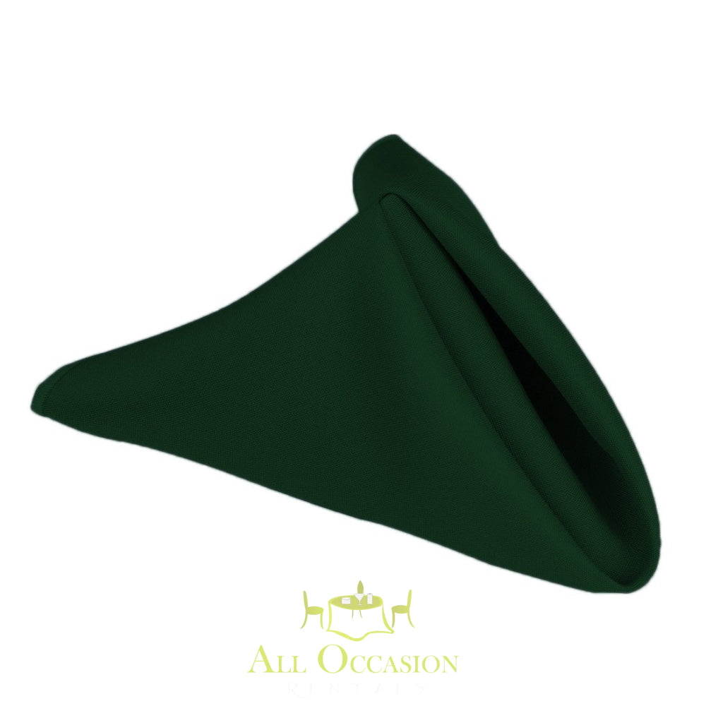Hunter green polyester napkin for Corona event rentals, adding elegance to wedding or party table settings.