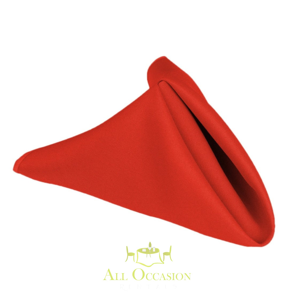 Red polyester napkin ideal for events and rentals from All Occasion, enhancing table settings for weddings and parties.