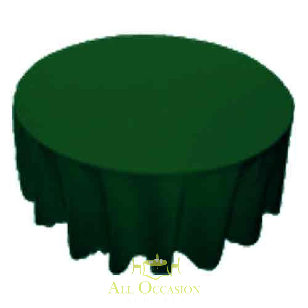 120 Inch Round Polyester Tablecloth Hunter Green on a large round table for elegant events and celebrations.