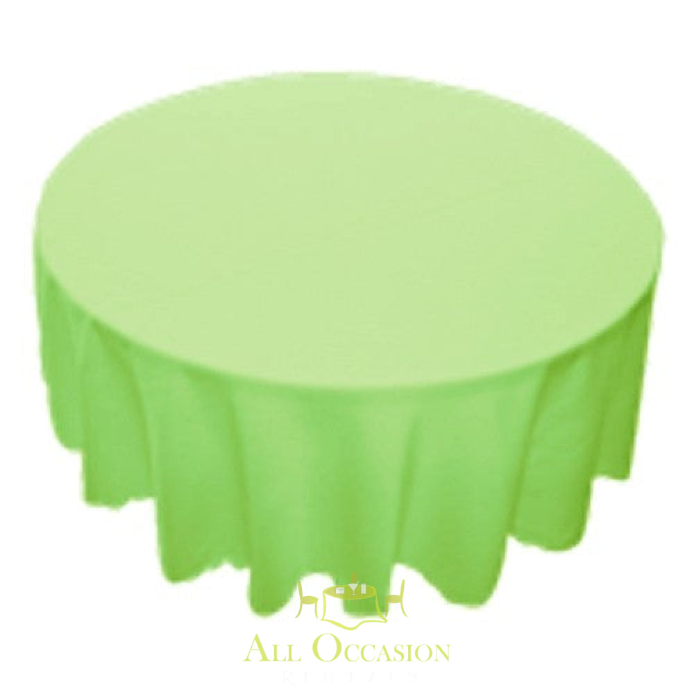 120 Inch Round Polyester Tablecloth Lime on a round table, perfect for events and celebrations.