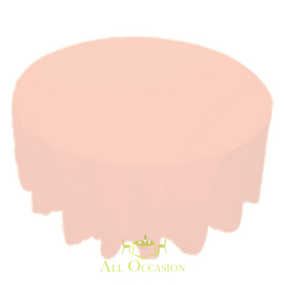 120 inch Round Polyester Tablecloth Pink on a round table, perfect for events like weddings and parties.