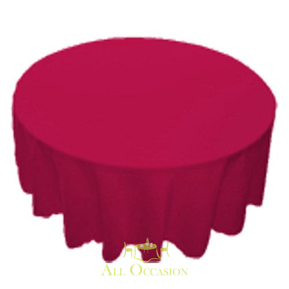 120 inch Round Polyester Tablecloth Rose elegantly draped over a round table, perfect for weddings and special events.
