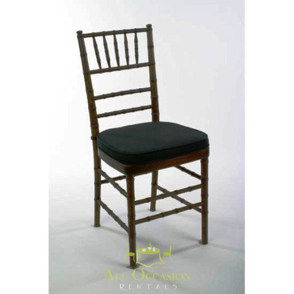Chiavari chair rental in mahogany with black cushion for events, weddings, and rentals in Corona.