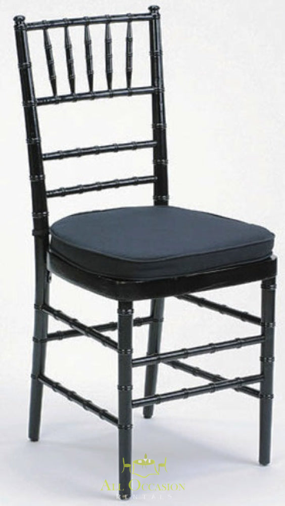 Chiavari chair in black with black cushion, ideal for weddings and events. Available through Corona event rentals.