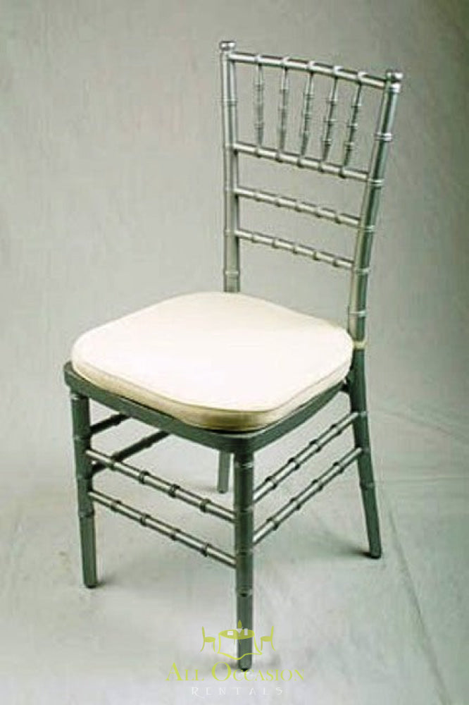 Silver Chiavari chair with ivory cushion for rental, ideal for weddings and events in Corona, CA.