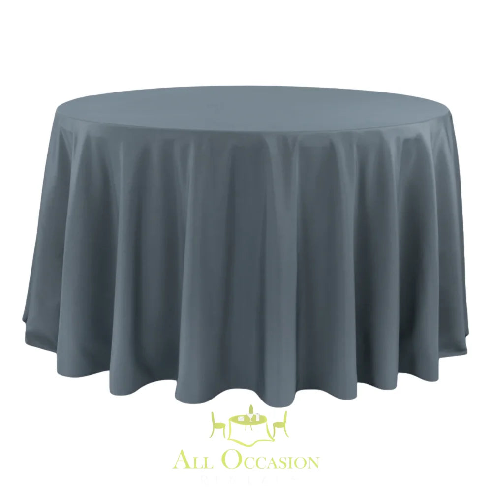132 Inch Round Polyester Tablecloth Dark Gray elegantly draped over a round table, perfect for any occasion.