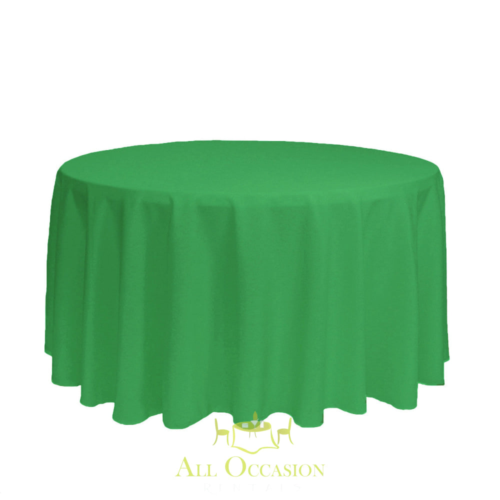 132 Inch Round Polyester Tablecloth Kelly Green displayed on a round table, perfect for elegant events and special occasions.