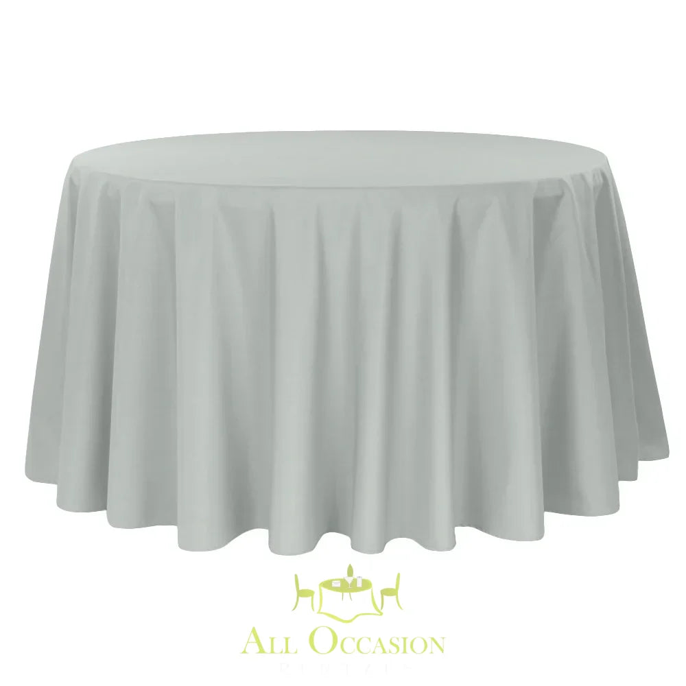 132 Inch Round Polyester Tablecloth Light Gray elegantly drapes over a large round table, ideal for any special event.