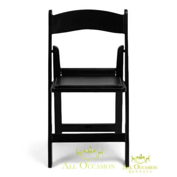 Resin black folding chair with padded seat.