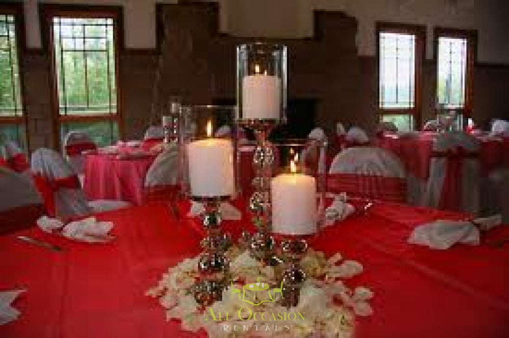 Elegant Center Pieces Candle with table linens for event rentals in Corona, perfect for weddings and parties.