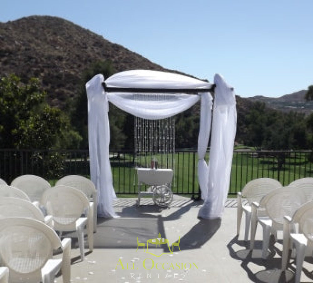 Bamboo chuppah with draping and crystal for weddings - available at Corona event rentals.
