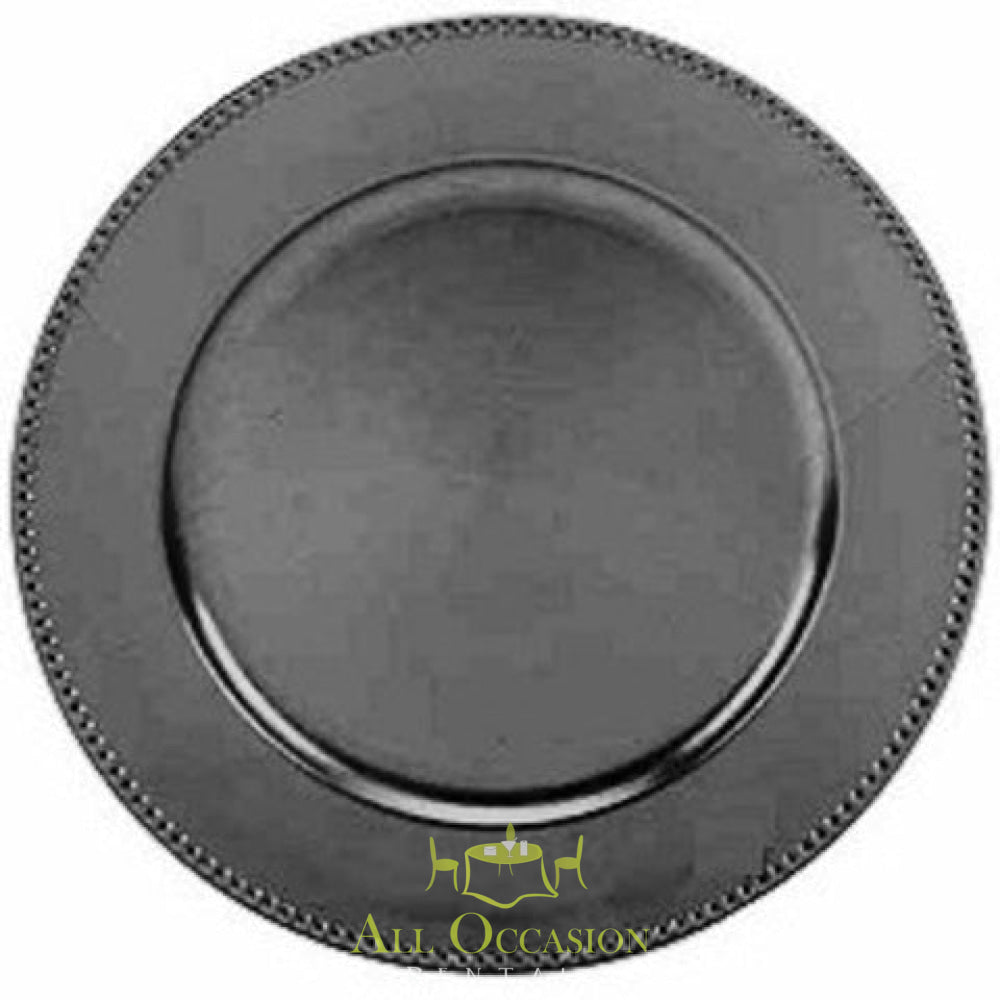 Black charger plate for events, perfect for wedding and banquet table settings. Available through Corona event rentals.