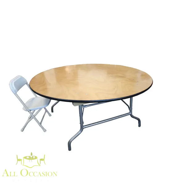 Plastic Folding Chairs White for Kids next to a round wooden table with metal legs.