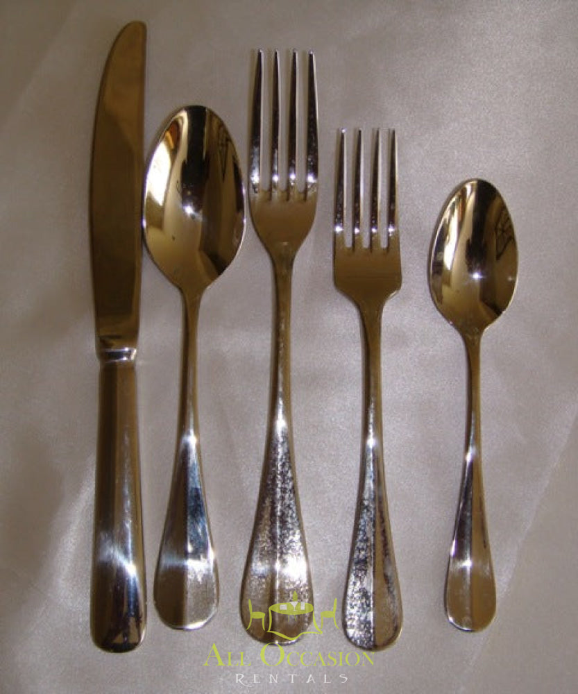 Elegant silverware set including knife, dinner forks, and spoons, perfect for Corona event rentals and wedding accessories.