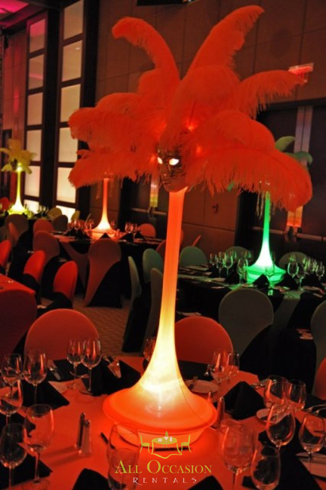 Elegant feather centerpieces at a festive event, ideal for Corona party rentals and Inland Empire event rentals.