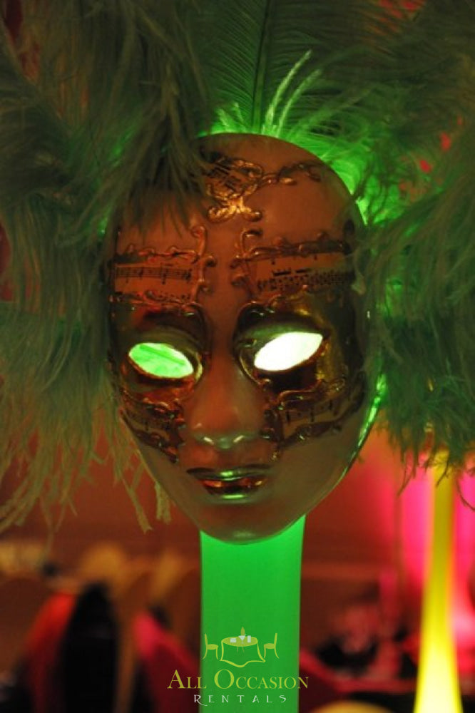 Feathers centerpiece decoration with illuminated mask, perfect for event rentals in Corona and Inland Empire.