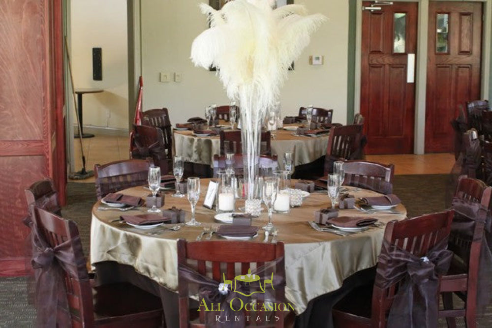 Elegant feathers centerpieces for event rentals in Corona, enhancing banquet tables and chair rentals.