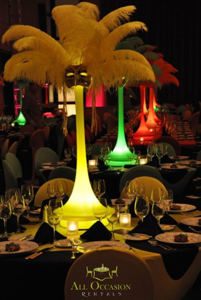 Vibrant feather centerpieces for event rentals, ideal for Corona party rentals and wedding receptions.