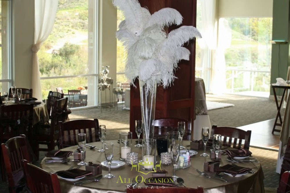 Elegant white feathers centerpiece for event rentals, ideal for weddings and parties in Corona, CA. Perfect for your celebration.