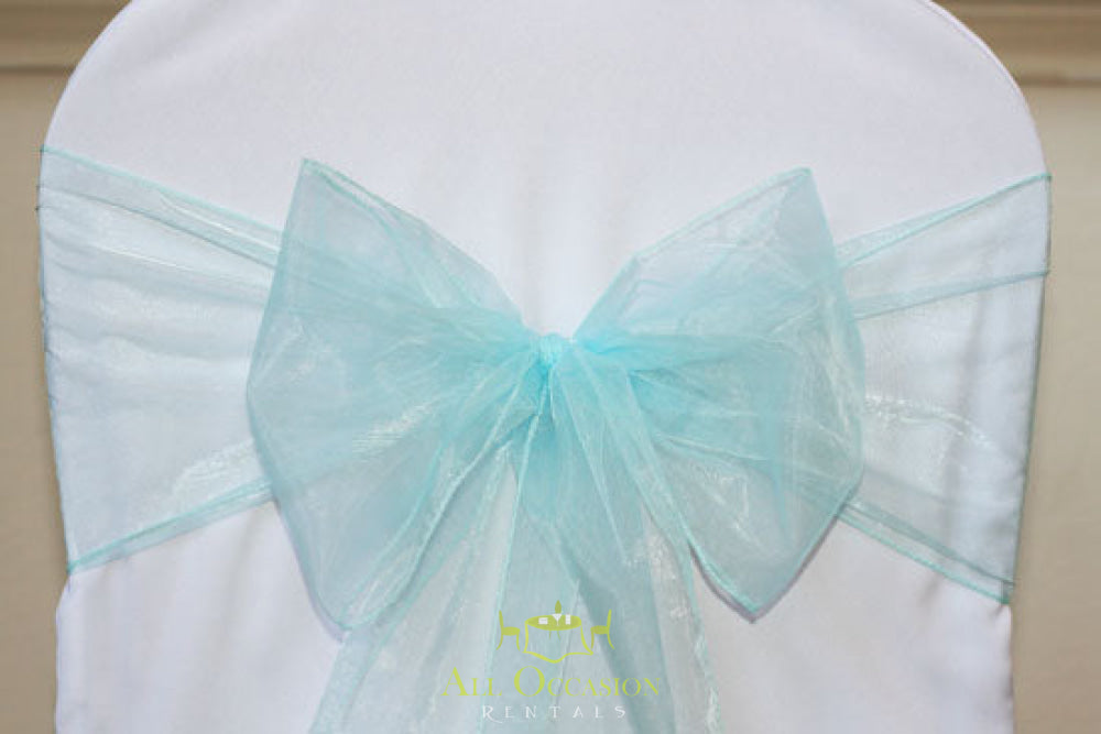 Organza sash in baby blue on a chair, perfect for Corona event rentals, weddings, and party decorations.