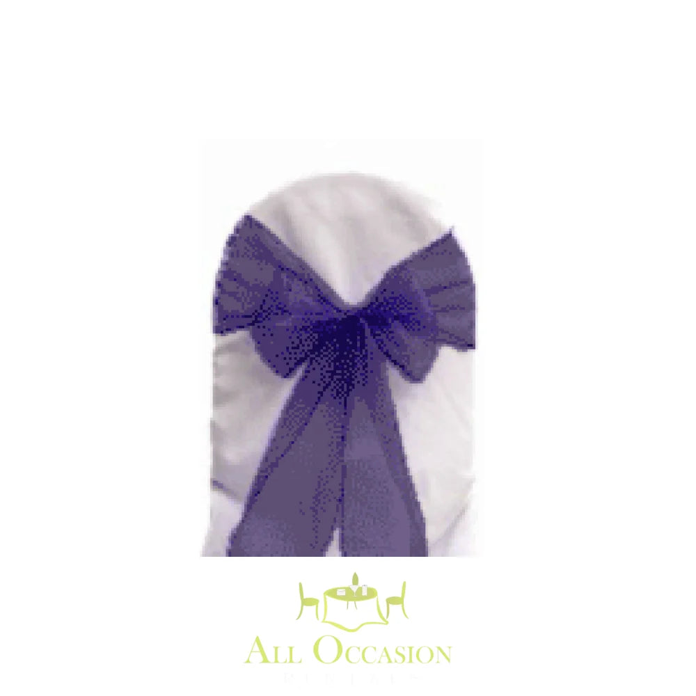 Organza sash in eggplant color tied on a chair for event rentals in Corona, perfect for weddings and parties.