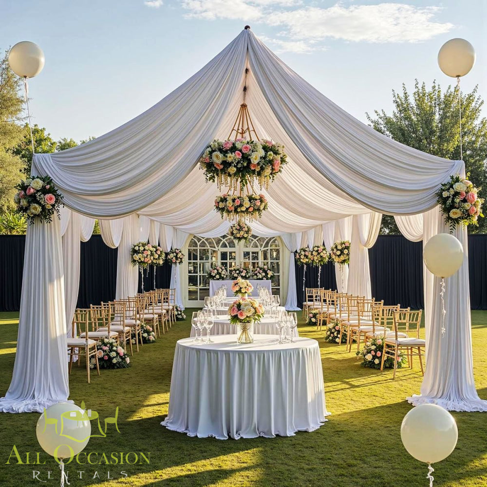Tent Liner 10' x 40' Rental enhances a beautifully draped event tent for weddings and special occasions.