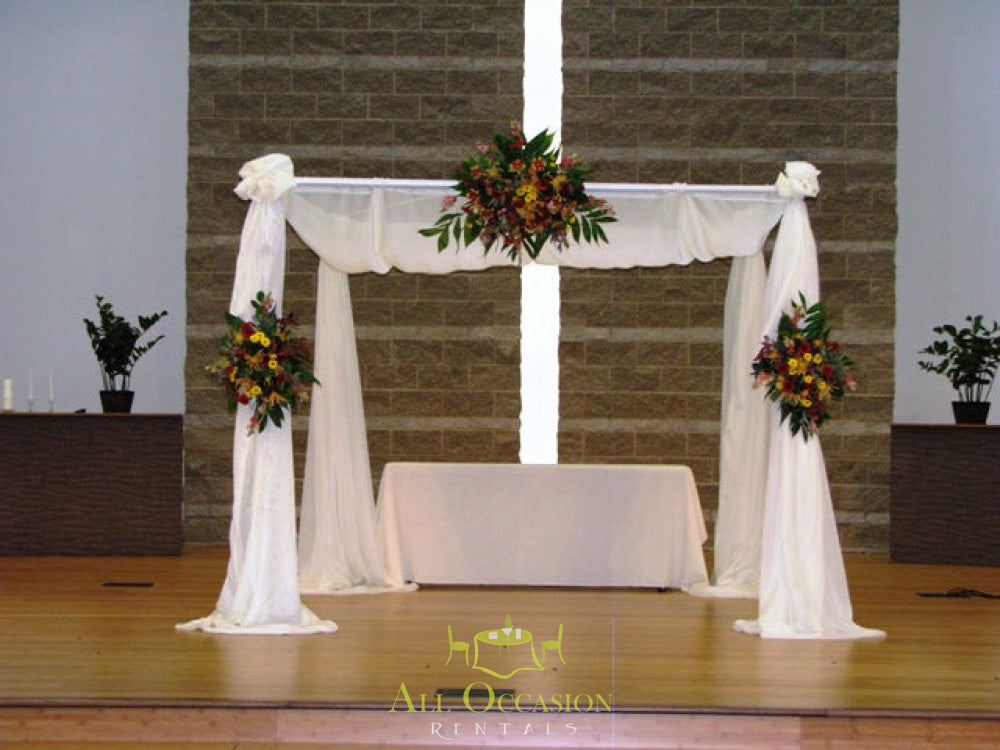 Iron square arch with draping and flowers for event rentals in Corona, perfect for weddings and receptions.