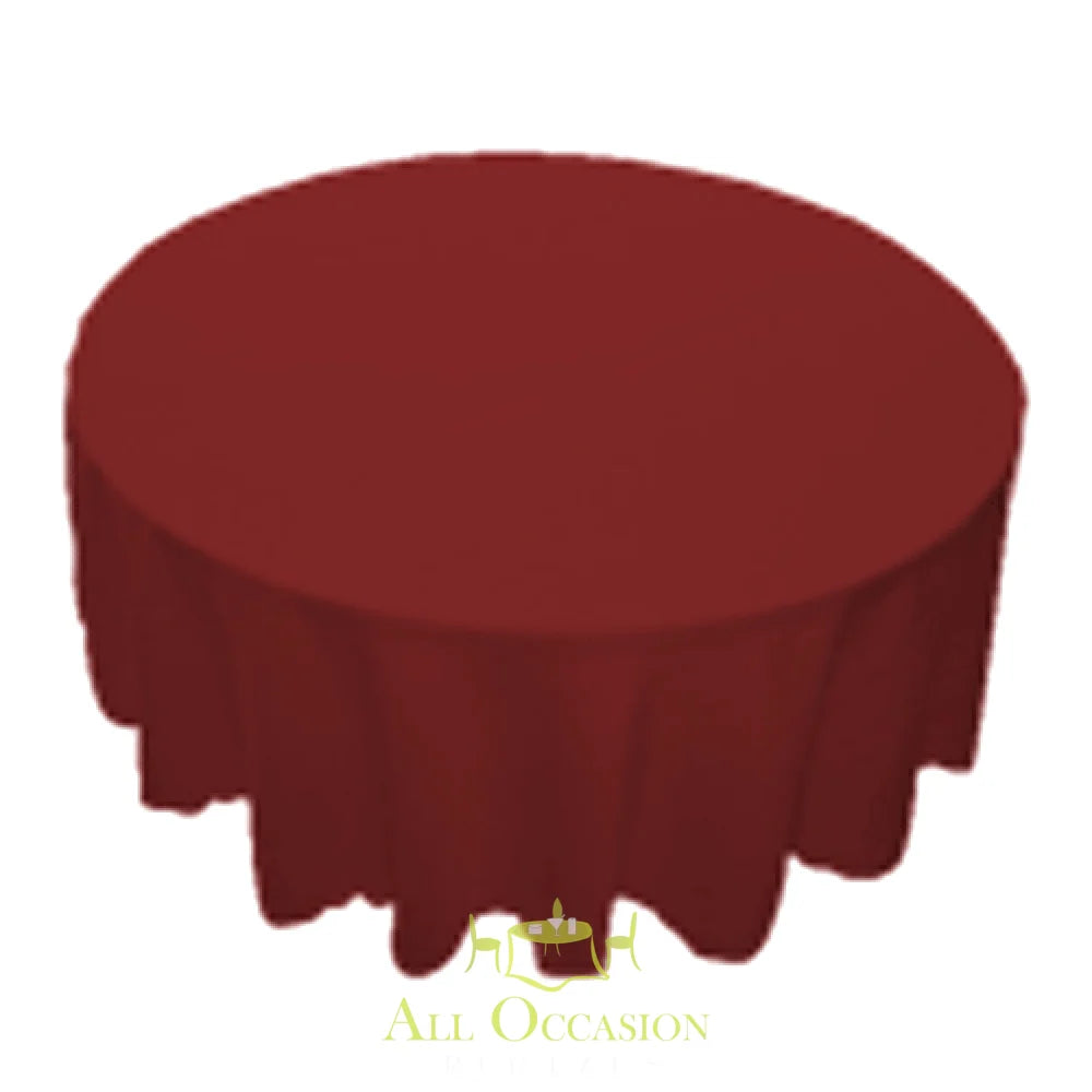 120 inch round burgundy polyester tablecloth for event rentals in Corona, perfect for weddings and parties.