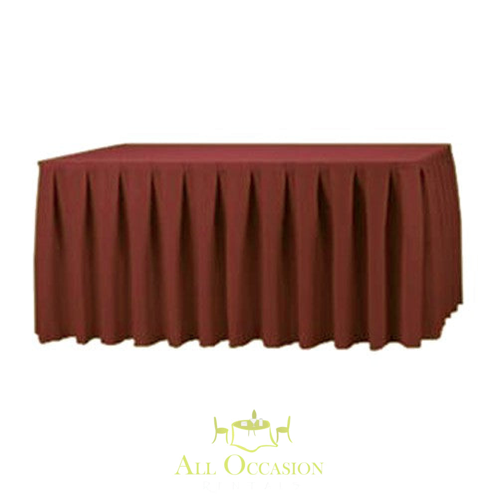 14ft burgundy polyester table skirt ideal for weddings and events, available through Corona event rentals.