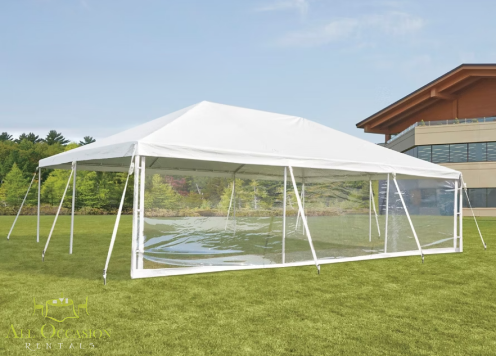Tent Clear sidewall providing visibility and protection for outdoor events under a spacious white tent.