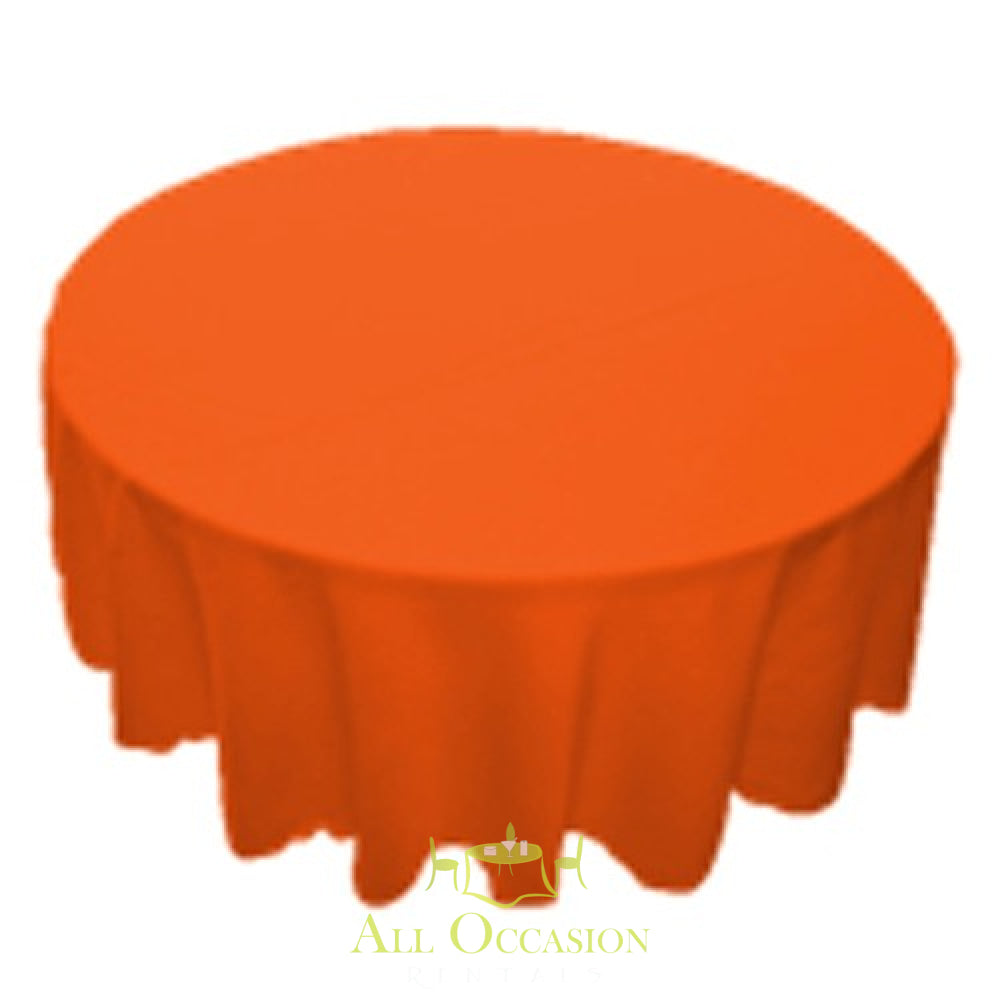 120 inch round orange polyester tablecloth ideal for events, weddings, and party rentals in Corona.