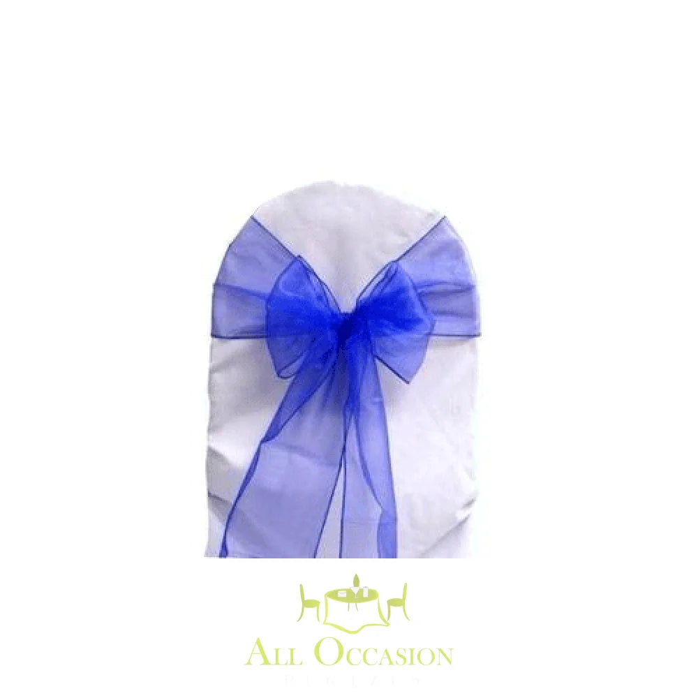 Royal blue organza sash on white chair cover, ideal for party rentals in Corona and Inland Empire events.