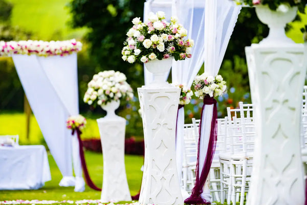 Elegant outdoor wedding ceremony setup with premium event rentals