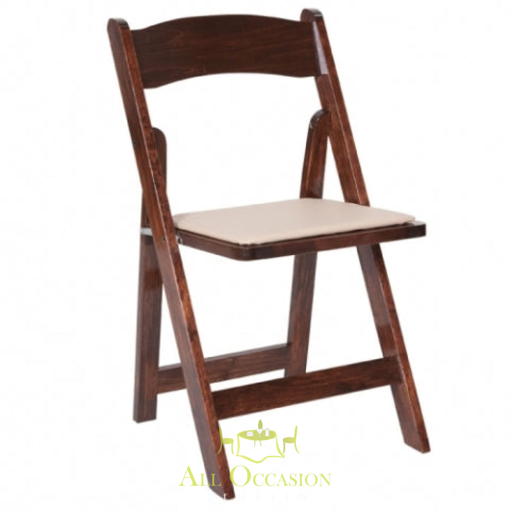 Wood fruitwood folding chair with padded seat for event rentals in Corona, perfect for weddings and parties.